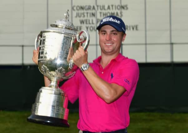Justin Thomas poses with the trophy following his two-shot victory in the US PGA Championship. Picture: Getty.