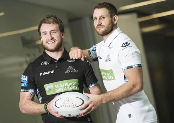 Stuart Hogg, left, and Tommy Seymour help to launch Glasgow Warriors three-year partnership with SP Energy Networks. Picture: SNS.