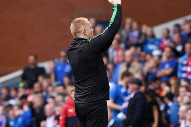 Hibs manager Neil Lennon gestures at the Rangers supporters after his side equalised at Ibrox. Picture: SNS.