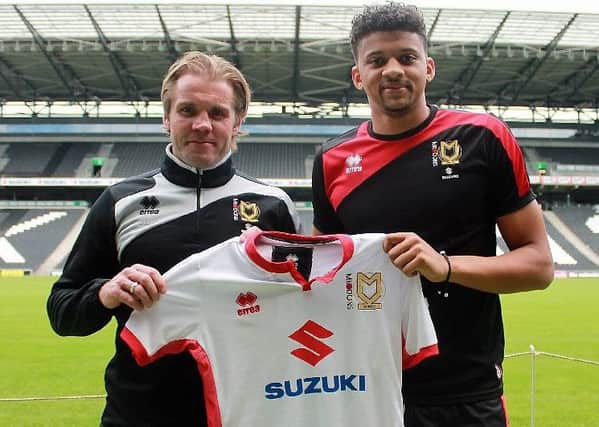 Osman Sow reunited with Robbie Neilson. Picture: MK Dons