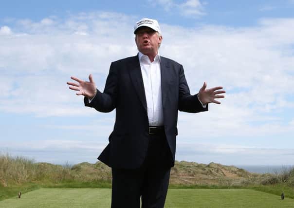 Donald Trump on a tour of Trump International Golf Links at Balmedie in June 2016. There are now plans to expand the resort north of Aberdeen. Picture: Andrew Milligan/PA Wire