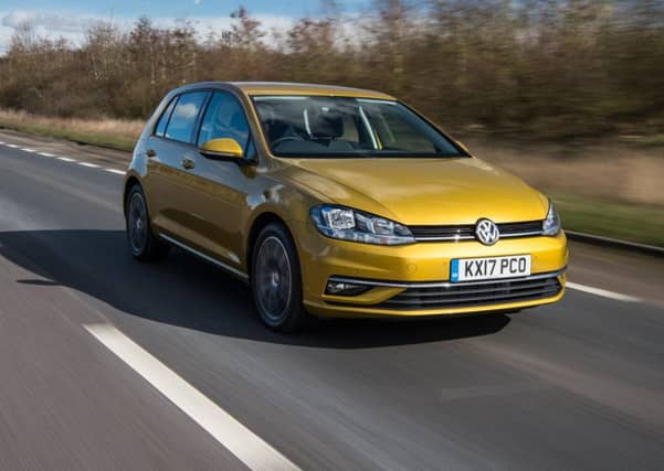 The new Golf SE in metallic turmeric finish