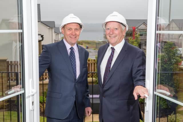 Bank of Scotland's Andy Seaton, left, with Dawn Homes founder Alan Macdonald. Picture: Contributed