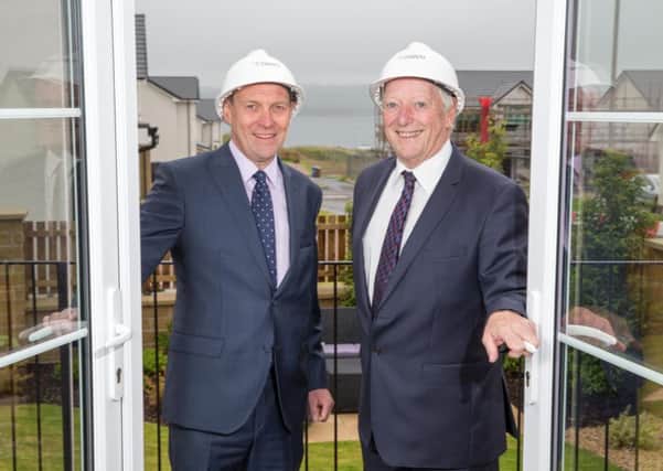 Bank of Scotland's Andy Seaton, left, with Dawn Homes founder Alan Macdonald. Picture: Contributed