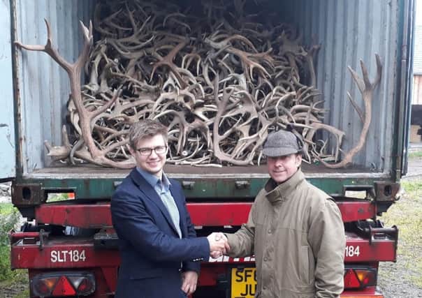 Deer farmer Rupert Shaw, right, with Hong Kong trading company boss Janis Varklas. Picture: NFU Scotland/PA Wire