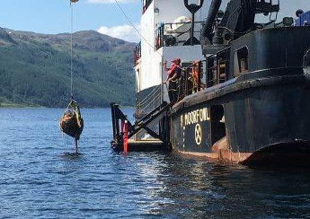 Highball bouncing bomb being raised from Loch Striven. Picture: Henry Paisey/Contributed