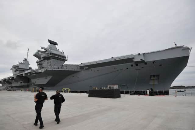 HMS Queen Elizabeth docked at Portsmouth Harbour. Picture: PA