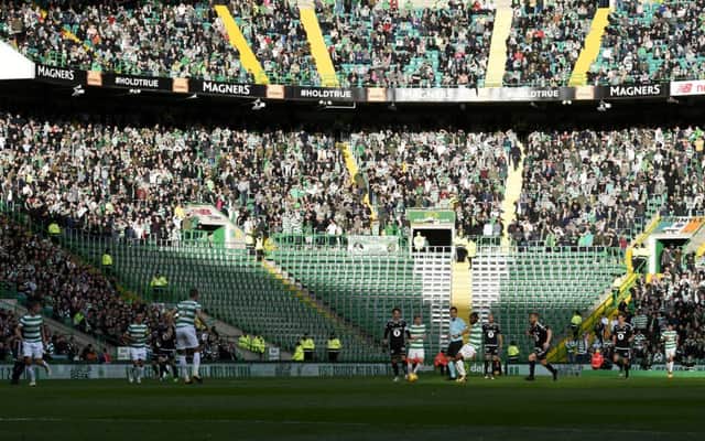 The space normally occupied by the Green Brigade sits empty at Celtic Park during the match against Rosenborg. Picture: SNS