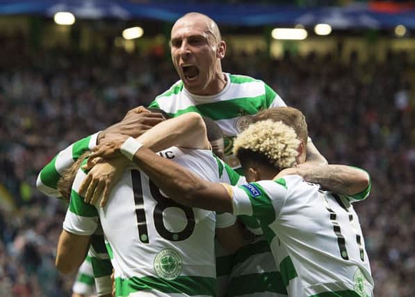 Captain Scott Brown celebrates the opening goal in Celtic's 5-0 win. Picture: SNS