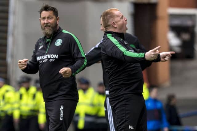 Neil Lennon, right, was criticised by the Rangers supporters' group for his celebrations at Ibrox. Picture: SNS