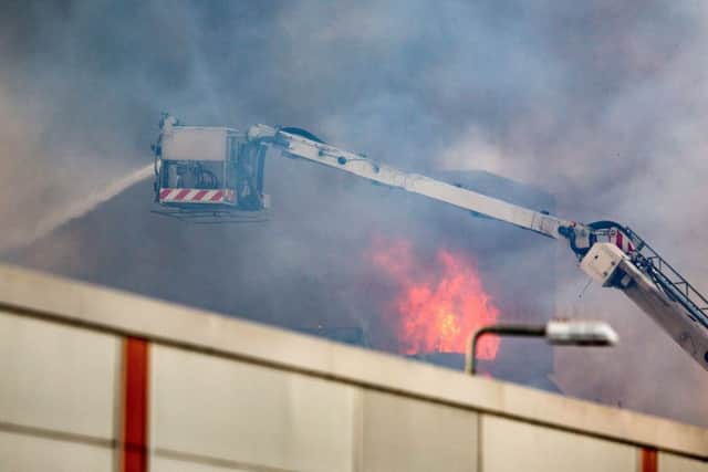 Firefighters attend the scene of a blaze at Blochairn Fruitmarket. Picture: Robert Perry/Getty Images