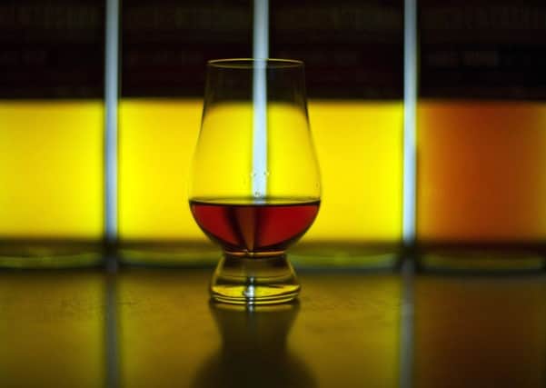 Adding a bit of water in your whisky, just before drinking it, makes it taste better, according to a survey. Picture: ANDY BUCHANAN/AFP/Getty Images