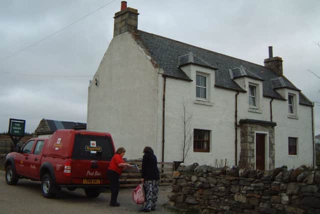 Susan Macleod, left, who has been the Postbus driver and delivery postwoman on the Lairg-Tongue route for 12 years, at Crask Inn in 2009.
Picture: Bob Barnes-Watts