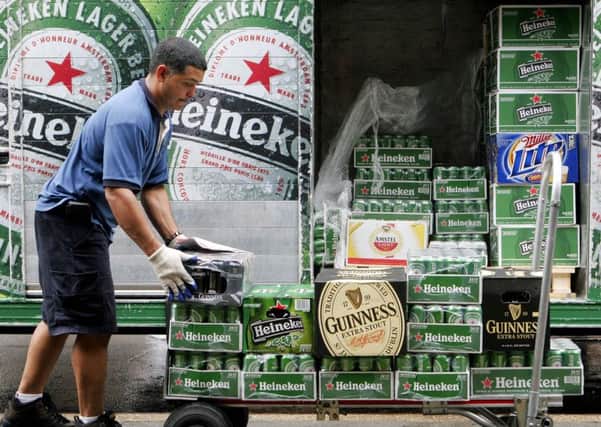 Heineken has satisfied competition concerns over its deal to buy Punch Taverns. Picture: Mark Lennihan/AP