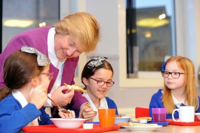 Former Church of Scotland Moderator Lorna Hood visits a school breakfast club in Denny. Picture: Gary Hutchison