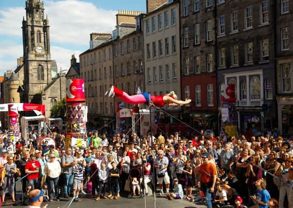 Visitors to Edinburgh are up on last August, one of several pieces of economic good news