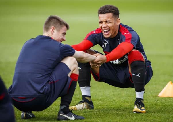 James Tavernier enjoys his stretching exercises as Rangers prepare for their Ladbrokes Premiership clash with Hearts at Ibrox. Picture: SNS