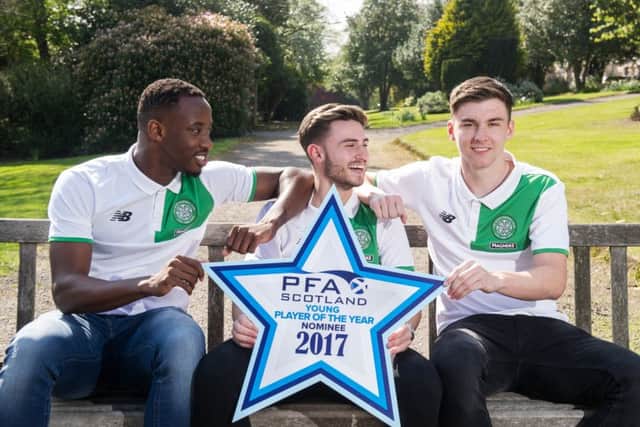 Moussa Dembele with both halves of Scottish football's favourite bromance. Picture: John Devlin