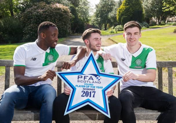 Moussa Dembele with both halves of Scottish football's favourite bromance. Picture: John Devlin