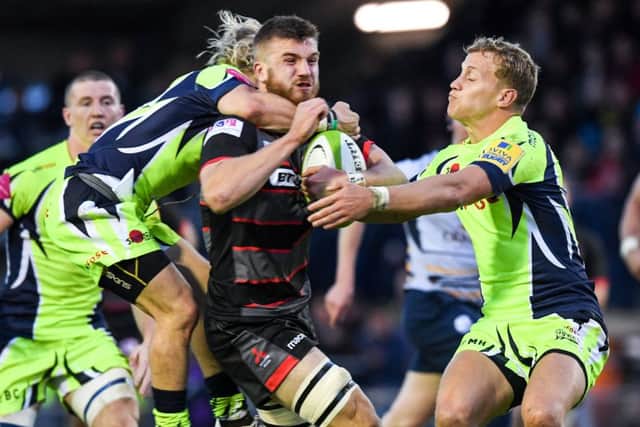 Luke Crosbie, one of several Edinburgh youngsters who showed up well in the second half, breaks through the Sale defence. Picture: Gary Hutchison/SNS