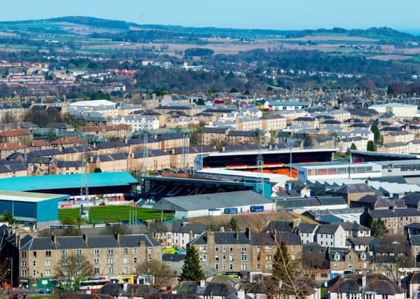 Neighbours and rivals: Dundees twin football clubs are separated by just 200  yards but the Dark Blues are planning to move some three miles away, a distance that could be a million miles for Aidan Smith