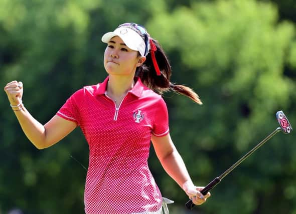 Danielle Kang celebrates after holing a putt as she helped the Americans to an afternoon clean sweep in the 15th Solheim Cup in Des Moines. Picture: Getty Images