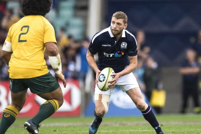 The chances of Blair Kinghorn challenging Finn Russell, right, for the No.10 jersey have been hampered by Edinburgh playing him at 15. Photographs: SNS