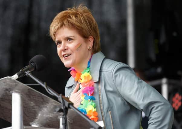 First Minister Nicola Sturgeon addresses the assembled crowd at Glasgow Pride.  (Photo by Robert Perry/Getty Images)