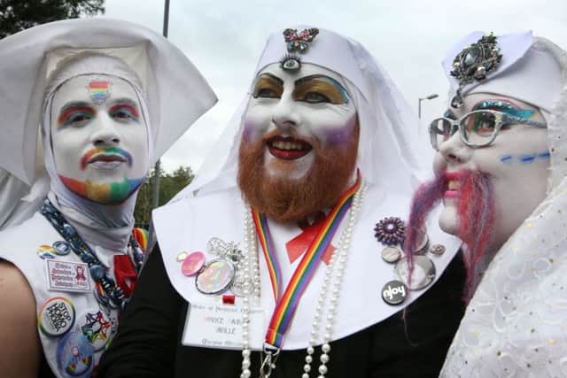 People in fancy dress take part in the Pride Glasgow parade.: David Cheskin/PA Wire
