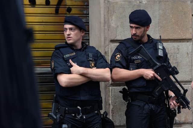 Police officers stand guard on Las Ramblas boulevard in Barcelona on August 19, 2017, two days after a van ploughed into the crowd, killing 13 persons and injuring over 100. Picture: Getty Images