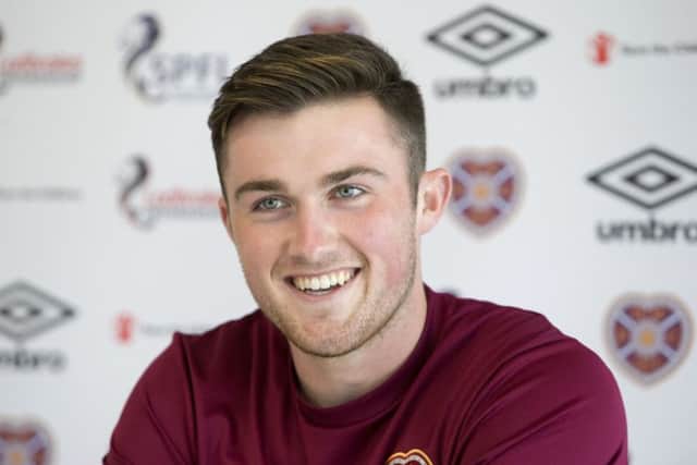 John Souttarsay interim head coach Jon Daly has established a solid relationship with the Hearts players. Picture: SNS.