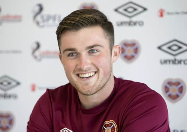 John Souttarsay interim head coach Jon Daly has established a solid relationship with the Hearts players. Picture: SNS.