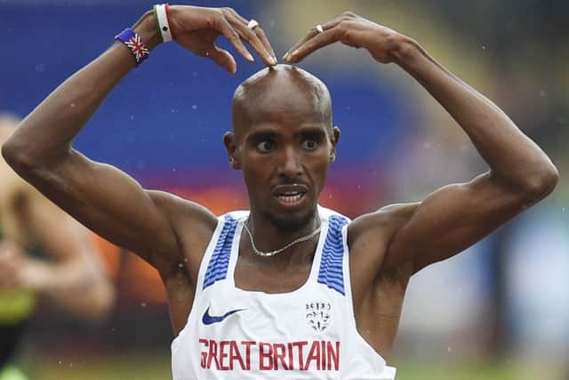 Britain's Mo Farah celebrates with his trademark "mobot". Picture: OLI SCARFF/AFP/Getty Images