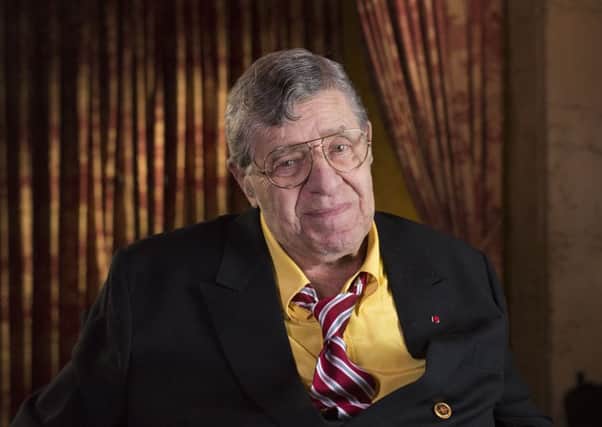 Jerry Lewis, the comedian and director whose fundraising telethons became as famous as his hit movies, has died aged 91. Picture: Dan Steinberg/Invision/AP Images, File