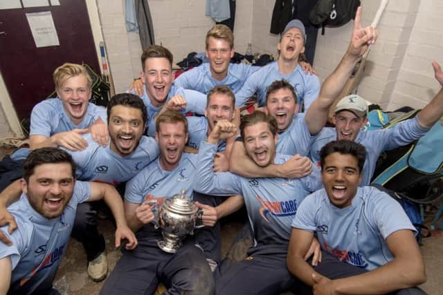 Carlton skipper Ally Evans has his hands on the Scottish Cup at long last while his team-mates celebrate. Picture: Donald MacLeod.
