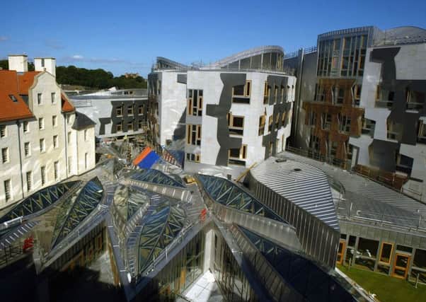 Holyrood research shows that smaller firms in the hospitality and retail sectors face a higher burden than big companies. Picture: Christopher Furlong/Getty Images