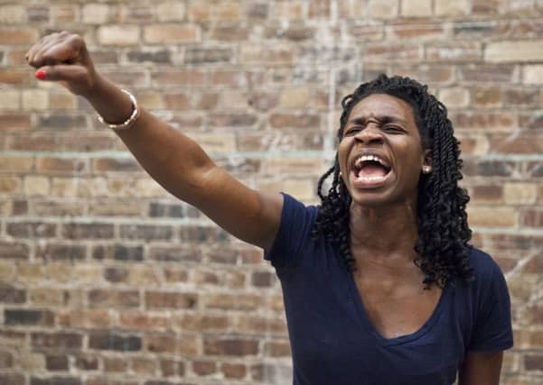 Apphia Campbell in Woke.