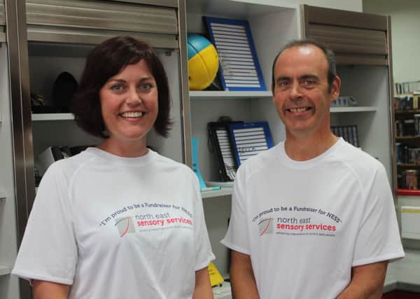 Graham Findlay, CEO from North East Sensory Services (NESS), is set to run his first half marathon at the Great Aberdeen Run, with guide runner Diana Daneels. Picture: Contributed