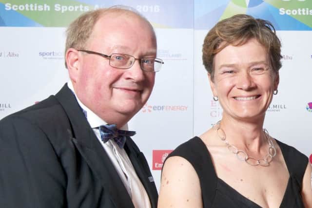 Paul Bush, pictured with Solheim Cup player Catriona Matthew, wants an end to complacency within Scottish golf.