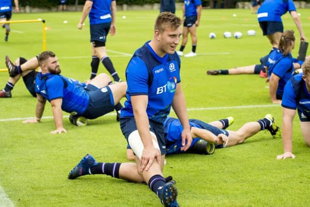 Matt Fagerson does some stretching exercises at the Scotland training camp. Picture: SNS/SRU.
