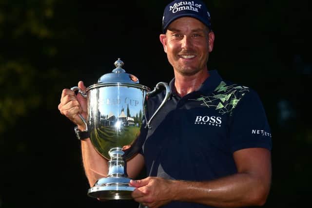 Henrik Stenson poses with the trophy after winning the Wyndham Championship. Picture: Getty.