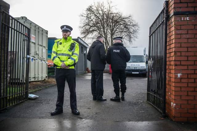 Chief Constable Phil Gormley mentioned the shooting of Ross Monaghan outside St Georges RC Primary School in Glasgow. Above, forensic officers search for evidence the day after the shooting. Picture: John Devlin