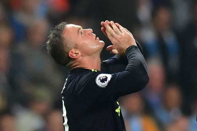 Wayne Rooney celebrates after scoring against Manchester City at the Etihad. Picture: AFP/Getty