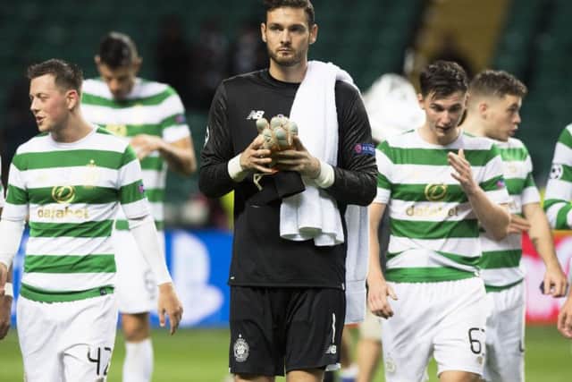 Craig Gordon leaves the pitch at full time after the 5-0 first leg victory, flanked by Callum McGregor (left) and Kieran Tierney. Picture: SNS Group