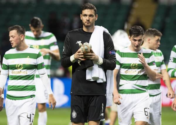 Craig Gordon leaves the pitch at full time after the 5-0 first leg victory, flanked by Callum McGregor (left) and Kieran Tierney. Picture: SNS Group