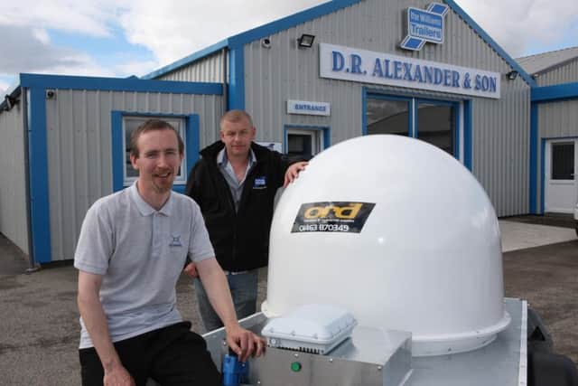 External Reality boss Richard Allan, left, with Mark Alexander of DR Alexander & Son. Picture: Contributed