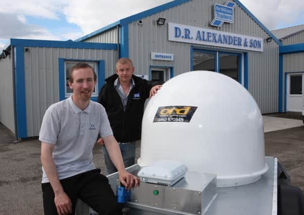 External Reality boss Richard Allan, left, with Mark Alexander of DR Alexander & Son. Picture: Contributed
