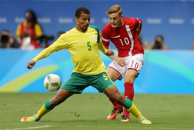 Coetzee Rivaldo, left, is on his way to Celtic Park. Picture: Getty