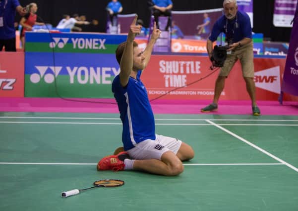 France's Brice Leverdez celebrates beating Lee Chong Wei at the TOTAL BWF World Championships. Picture: Lorraine Hill