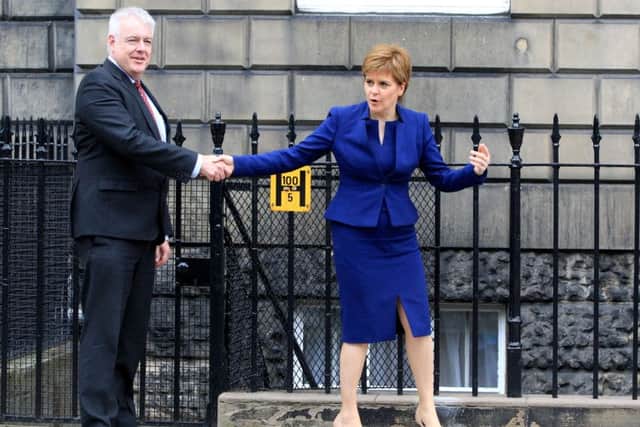 First Minister of Scotland Nicola Sturgeon and First Minister of Wales Carwyn Jones meet on the steps of Bute House. Picture: PA